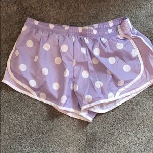 Light purple running shorts with polka dots